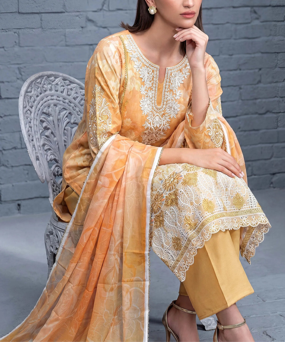 Yellow Embroidered Unstitched Suit Sitting CloseUp