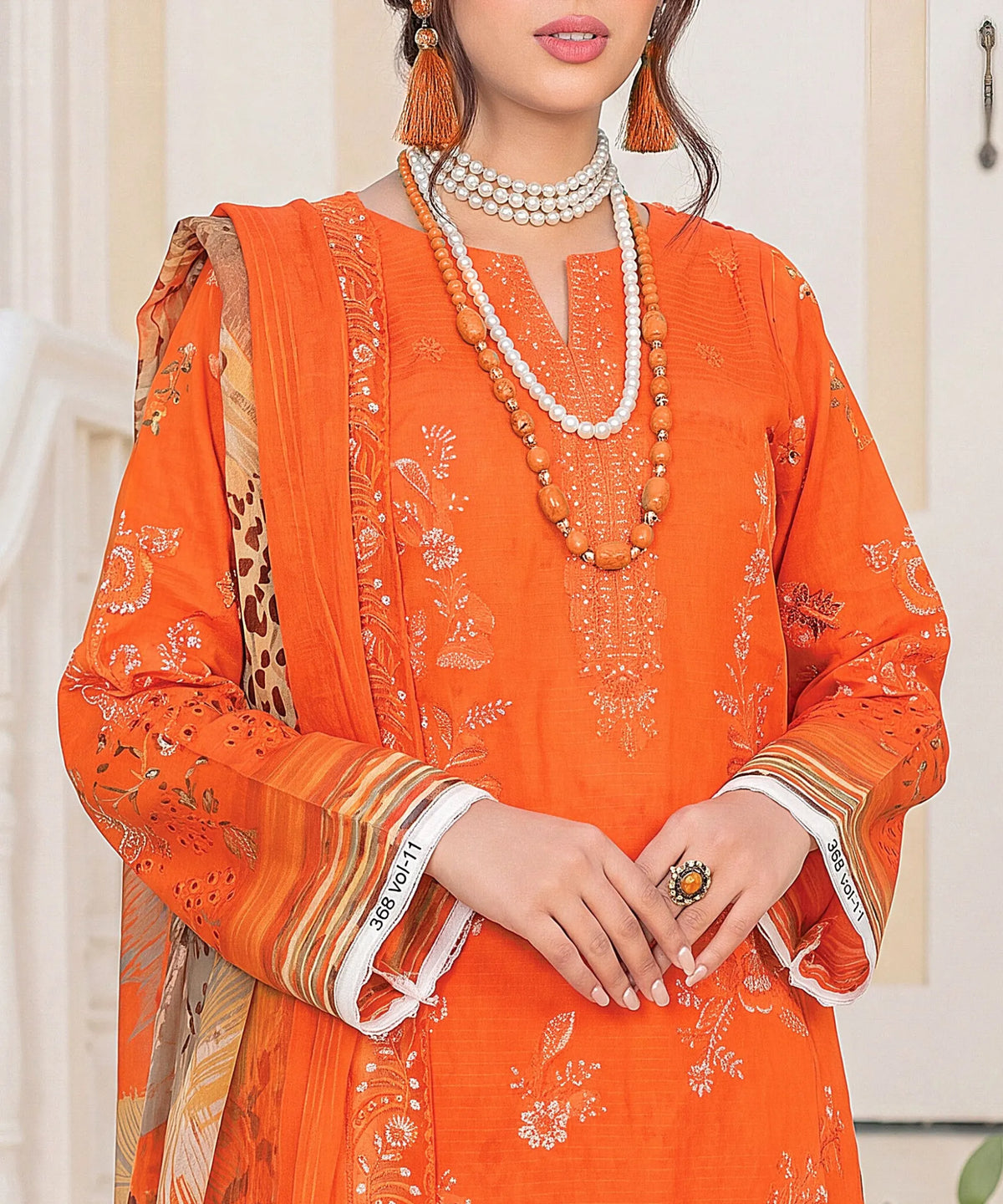 Orange Embroidered Unstitched Suit Neck line Embroidery Detail