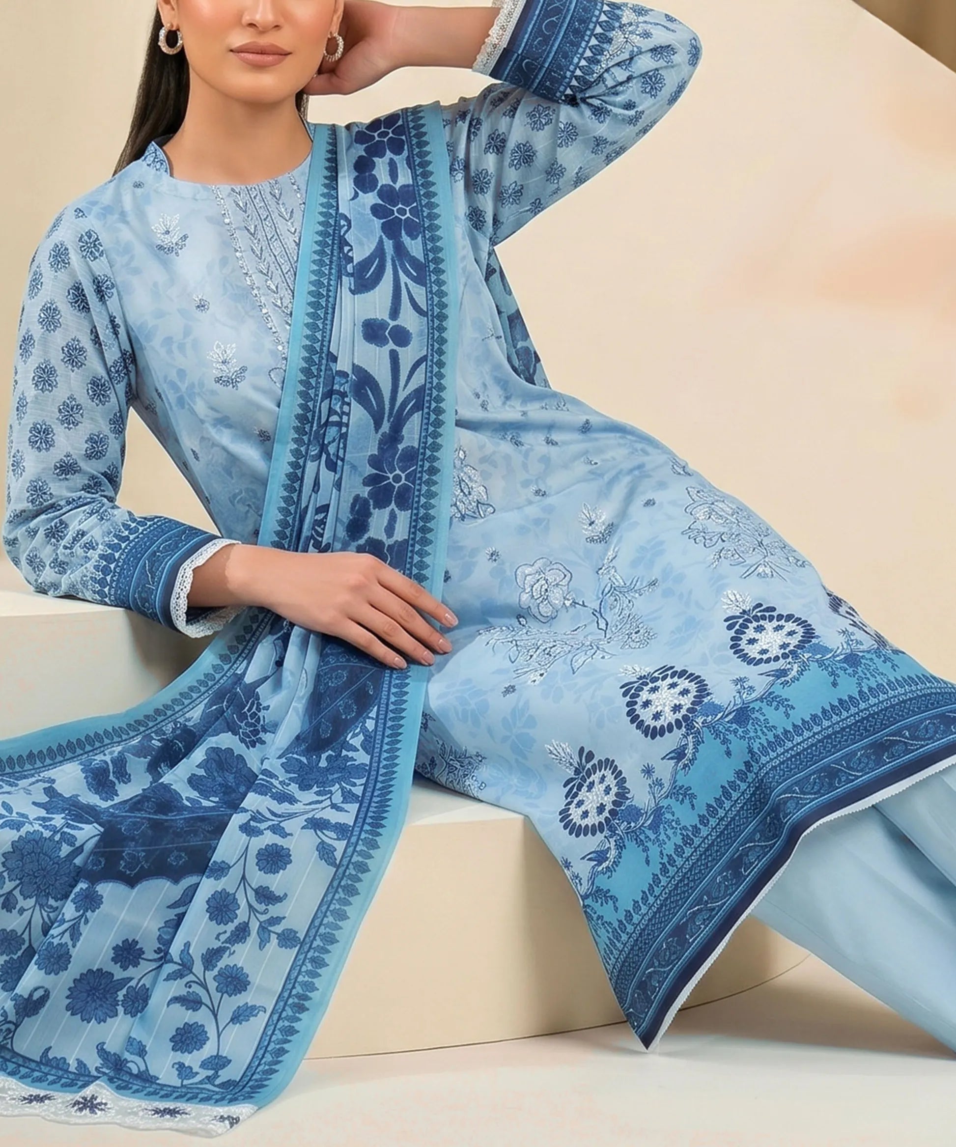 Sky Blue Embroidered Unstitched 3PC Suit Sitting Pose