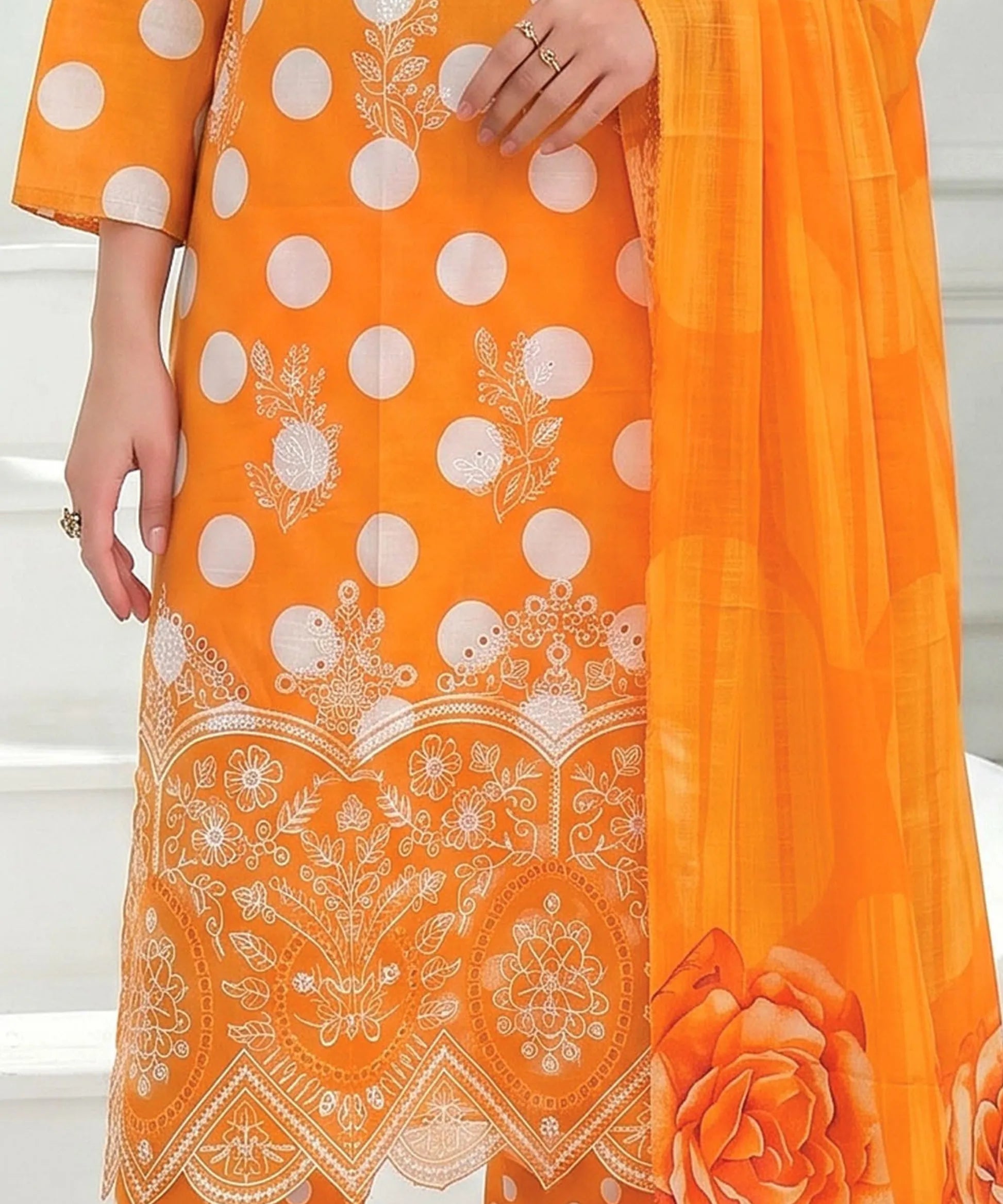 Orange Embroidered Unstitched 3PC Suit Sitting Pose